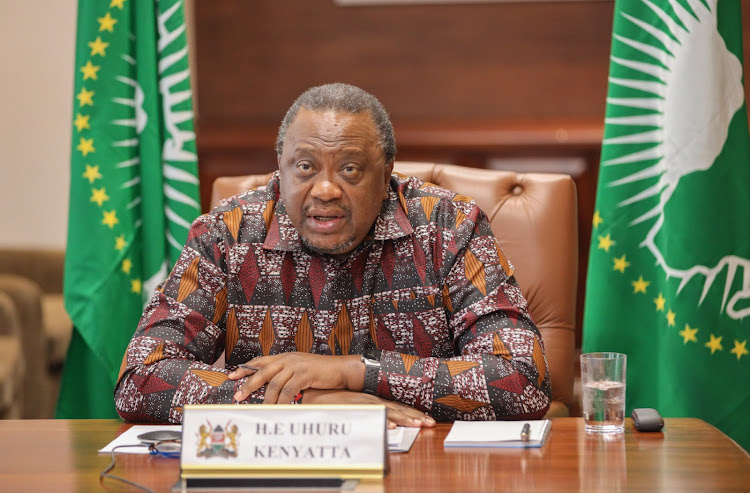 Retired President Uhuru Kenyatta speaks during virtually convened meeting of the AU on the status of the Ethiopia-Tigray peace agreement on December 1, 2023