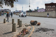 Debris in the street following rioting in the Soweto district of Johannesburg, South Africa, on Thursday, July 15, 2021. 