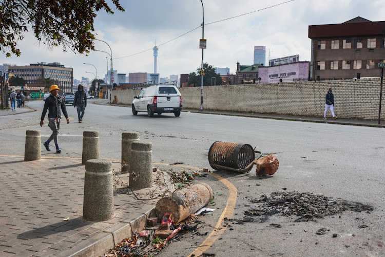 Debris in the street following rioting in the Soweto district of Johannesburg, South Africa, on Thursday, July 15, 2021.