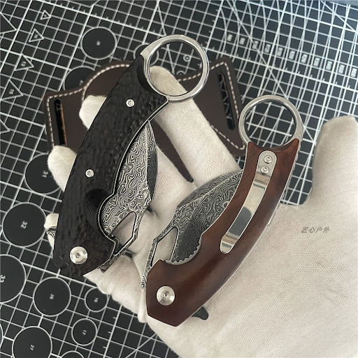 Title 7, Damascus Patterned Steel Folding Knife