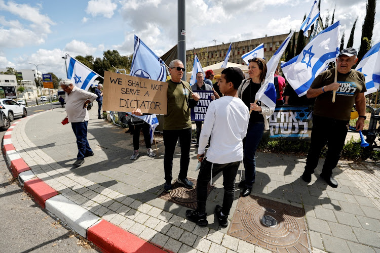 Members of the 'Brothers in Arms' reservist protest group demonstrate in Kiryat Ono, Israel. Picture: AMIR COHEN