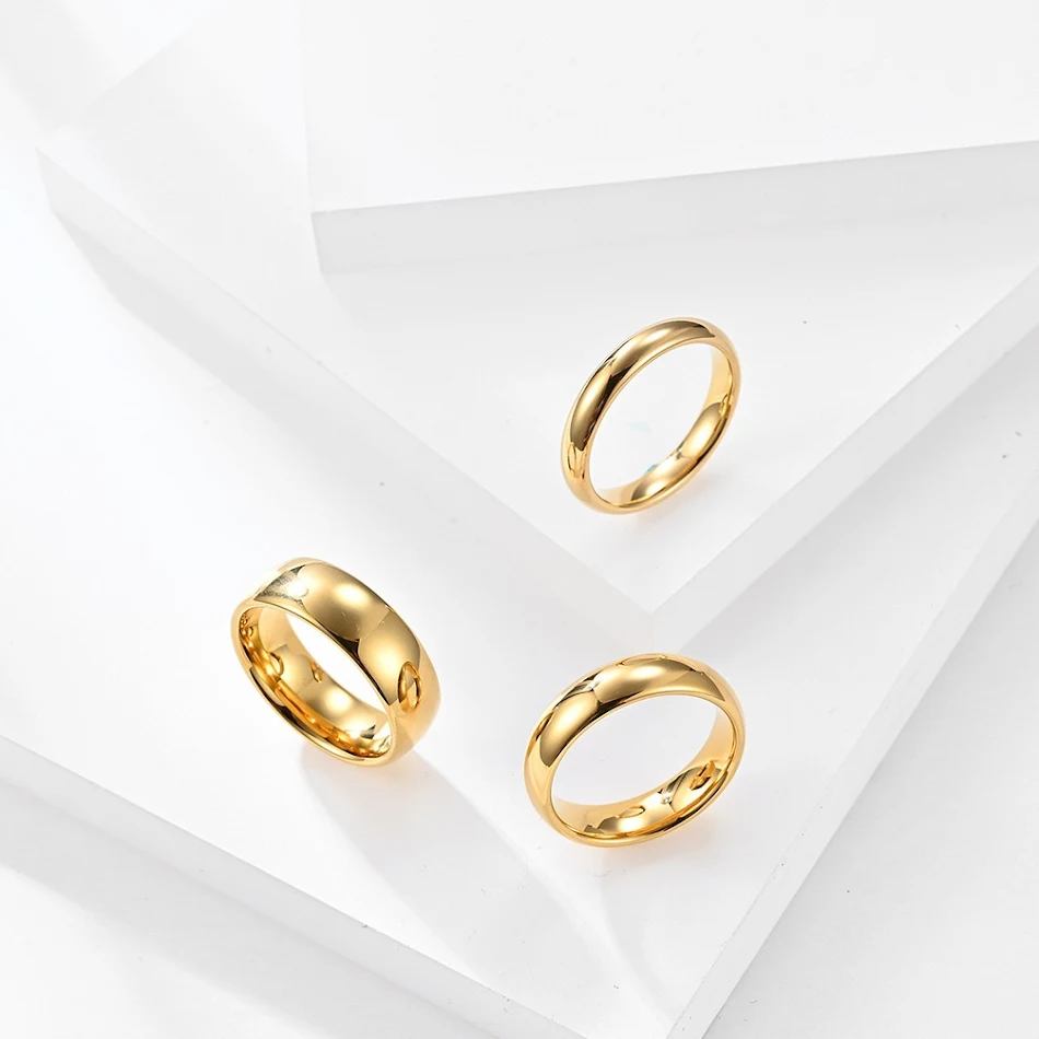 Bague en tungstène plaqué or 18 carats, style unisexe simple et sans genre, pour un look élégant et durable au quotidien.