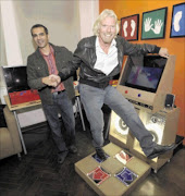 Yashwin Mohan gives his new mate, Sir Richard Branson, a hand