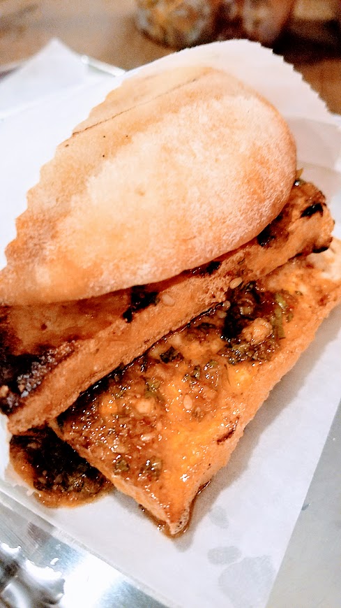 Danwei Canting offers three burger/sandwiches, one of which is this vegetarian Spicy Tofu Rou Jia Mou with tofu roasted with cilantro, sesame, and chilies