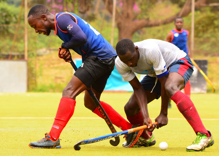 Western Jaguars' Allan Malit (L) battles for the ball with Moses Omamo of Sailors in a past KHU Premier League match