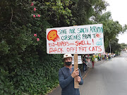 Aaron-Luke Rielly was among protesters who picketed Shell garage Paradise Motors, in Newlands, Cape Town, on December 4 2021.