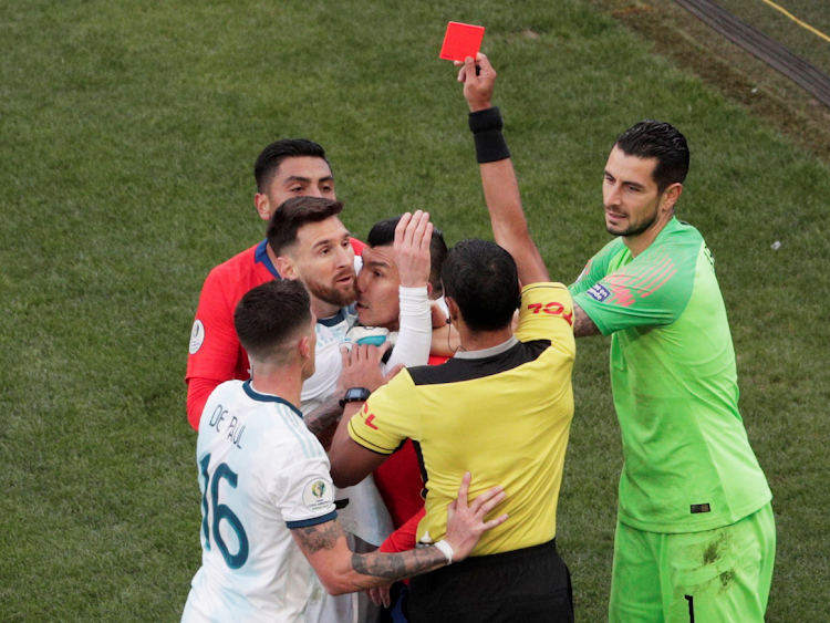 Argentina's Lionel Messi and Chile's Gary Medel are sent off by referee Mario Diaz de Vivar