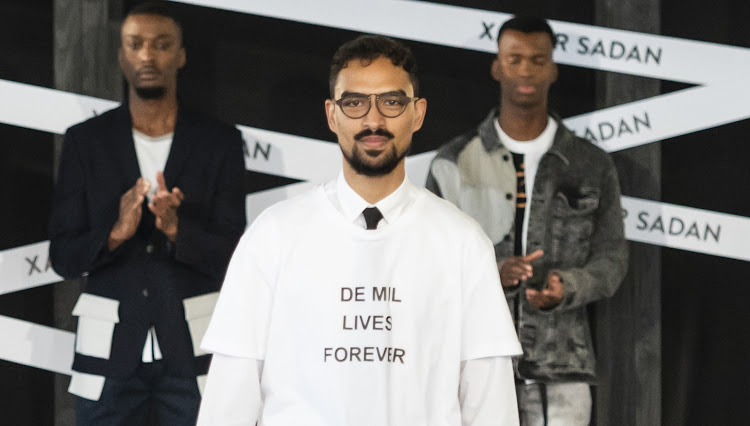 Michael Reid of Xavier Sadan in a slogan tee paying tribute to the late designer Coenraad De Mol.