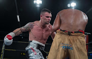 (L-R) Kevin Lerena from South Africa punches Vikapita Meroro from Namibia during Cruiserweight bout between Kevin Lerena and Vikapita Meroro at Emperors Palace on February 04, 2017 in Johannesburg, South Africa. 