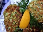 Crispy Golden Cheezy Zucchini Fritters was pinched from <a href="http://mouthwateringvegan.com/2013/07/04/crispy-golden-cheezy-zucchini-fritters/" target="_blank">mouthwateringvegan.com.</a>