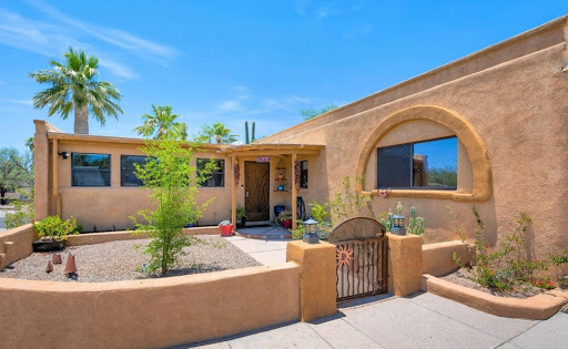 Front beige house, tree-filled garden - Buy this luxury property in Tucson, 4 bedrooms