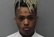 Rapper XXXTentacion was shot and killed in a suspected robbery on Monday.