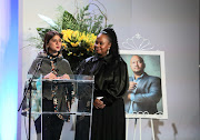 Zakira Mahomed, flanked by Sakina Kamwendo, addresses mourners of broadcaster and author Eusebius McKaiser and at his memorial service on Tuesday.