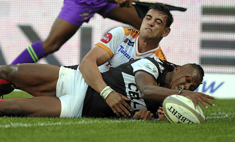 Sibusiso Nkosi of the Sharks dots down in his team's 45-15 thrashing of the Cheetahs.