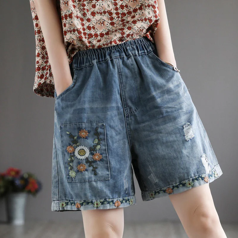 Short en jean déchiré taille haute vintage pour femme, idéal pour un look décontracté et tendance, confortable et stylé pour toutes occasions.
