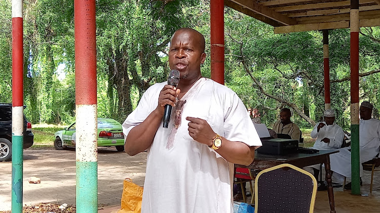 Matuga MP Kasim Tandaza addresses the couples after gracing a mass wedding marriage exercise in Kwale county on Friday, March 1, 2022.