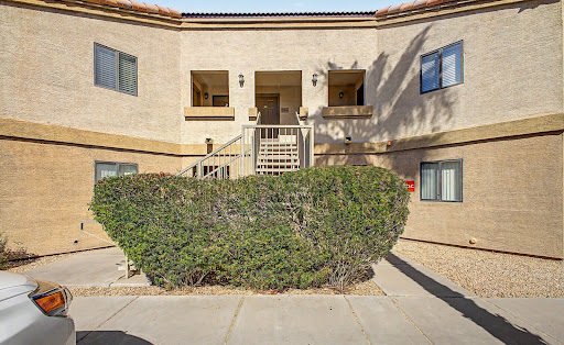 Building facade with outdoor staircase in this luxury property for sale in Chandler ($175,000)