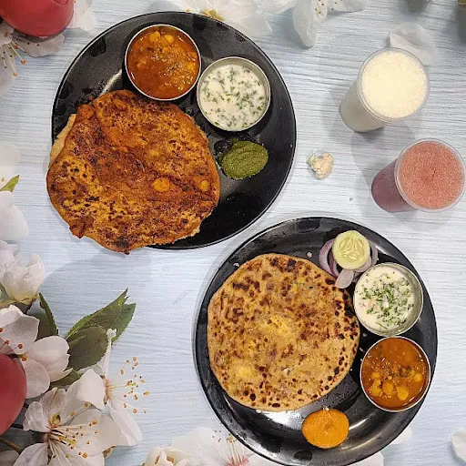 2 Gobi Paratha +2 Schezwan Paneer Paratha+1 Lassi +1cold Coffee