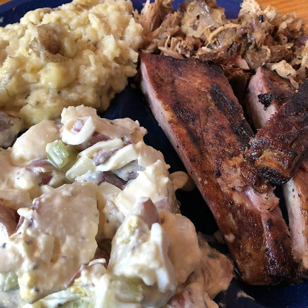 Ribs (yum), pulled pork (yum), potato salad (wouldn’t get it again wasn’t my favorite), garlic mashed (yum!)

Meat wasn’t salty like most smoked meat at bbq places which was a plus for me!