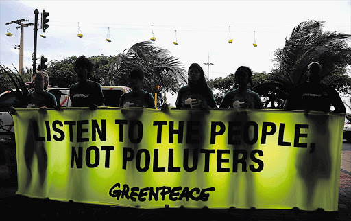 Greenpeace activists at the United Nations' COP17 conference. File photo.