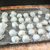 Thumbnail For Oreo Balls Setting Up On Waxed Paper.