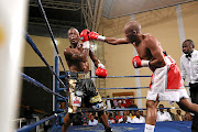 Simpiwe  Vetyeka throws a punch at Thompson Mokwana at the Orient Theatre in one of his gruelling fights. 