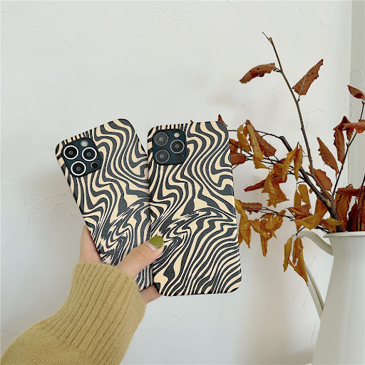 Title 2, Black wavy pattern phone case offering stylish ...