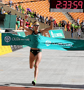 Winner of the 2019 Soweto Marathon women's section,  Irvette  van Zyl, at the finishing line  at FNB Stadium,  yesterday.