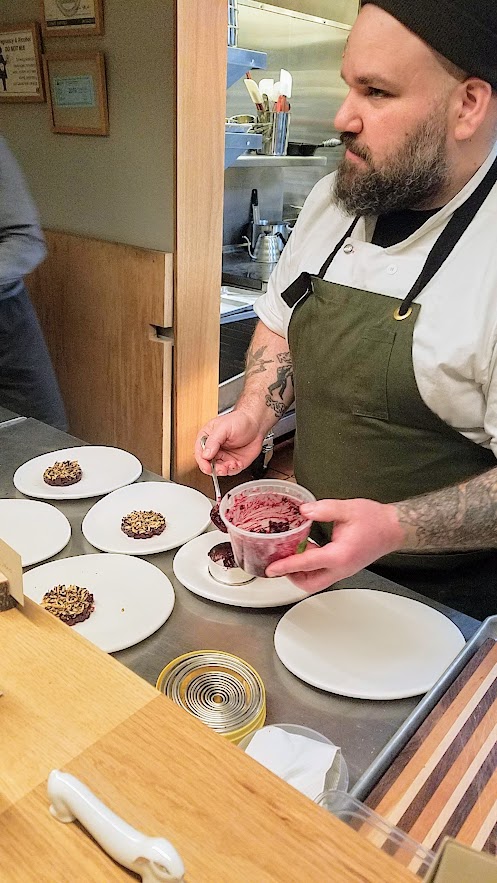 Farm Spirit, an all vegan restaurant, a take on Beet tartare with Chewy beets, pickled shiso, grapes turned into raisins, mache, fennel, popped wild rice