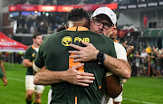 Springbok coach Jacques Nienaber embraces captain Siya Kolisi after the Rugby Championship match against Argentina at Kings Park on September 24 2022.