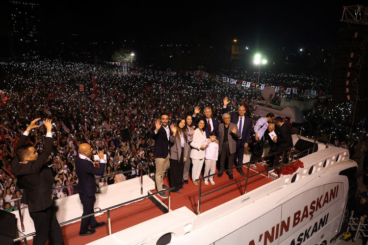 Ankara mayor Mansur Yavas, mayoral candidate of the main opposition Republican People’s Party (CHP), greets his supporters at the CHP headquarters following the early results during the local elections in Ankara, Turkey, on Sunday. Picture: REUTERS/CAGLA GURDOGAN