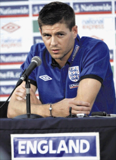 England's Steven Gerrard speaks during a news conference at the Royal Bafokeng Sports Campus near Rustenburg, June 10, 2010. REUTERS/Darren Staples (SOUTH AFRICA - Tags: SPORT SOCCER WORLD CUP)