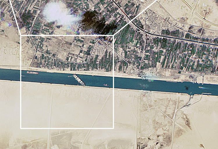 A satellite image shows the Suez Canal blocked by the stranded container ship. Picture: ROSCOSMOS/REUTERS