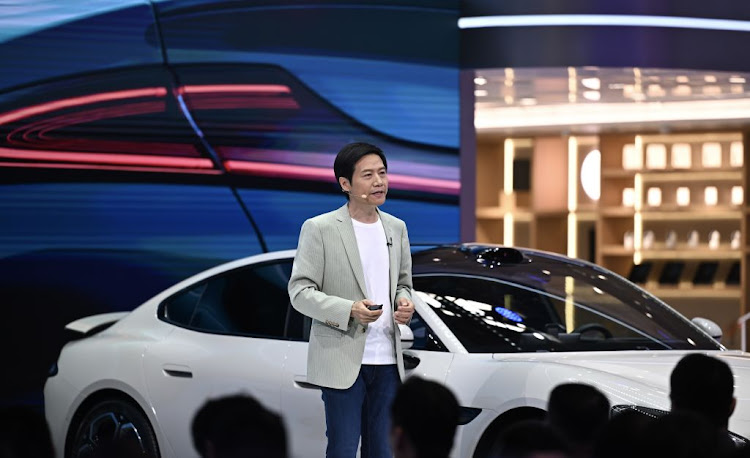 Xiaomi CEO Lei Jun says locked-in orders for its sporty SU7 sedan had hit 75,723 and that buyers included owners of cars such as BMWs and Audis.