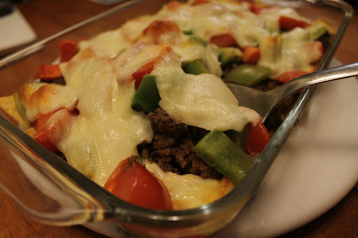 Flavorful ground beef covered in cheese and veggies.