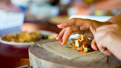 Rolling spring rolls at Lanta Thai Cookery School