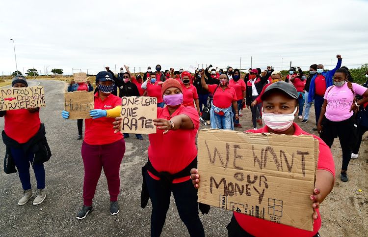 Lear Corporation employees in the Markman Industrial area demand the money they say is owed to them by the company