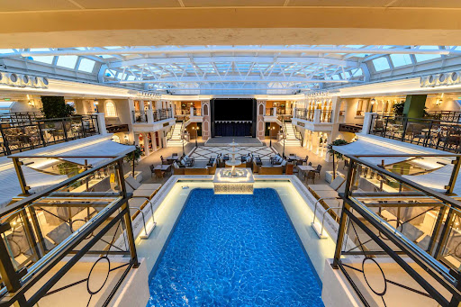 The Lido Deck on Carnival Venezia features an enclosed pool, an Aquapark with water slide, high-rope garden and mini-golf course.