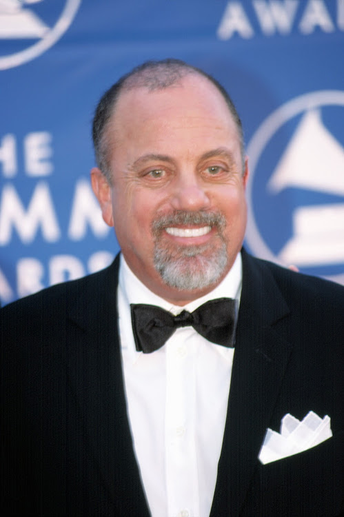 Billy Joel, best known as the Piano Man.