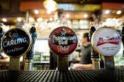 The tap for Franciscan Well beer is pictured at O'Neills pub in a former Presbyterian church in Muswell Hill, north London