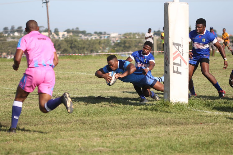 Vuyisani Mvuso of Swallows dives over the line to score against Ncerha Leopards at Swallows Rugby club in Mdantsane.