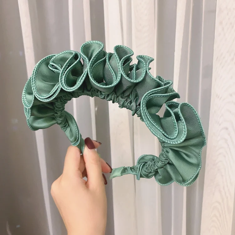 Bandeau cheveux pressés Dongdaemun, doux et exagéré. Un accessoire tendance pour un look unique et une personnalité affirmée