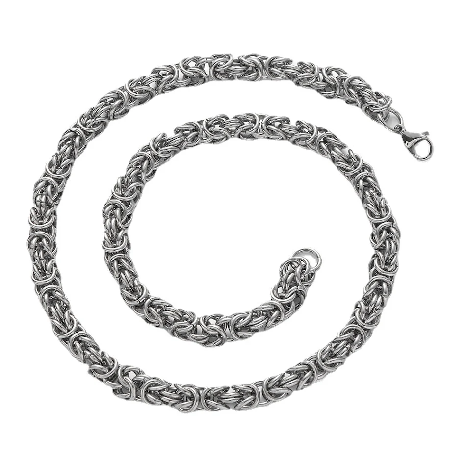 Chaîne Domineering Hip Hop en acier inoxydable, tissée à la main, avec un design de chaîne de quille. Un style audacieux et une résistance à toute épreuve.