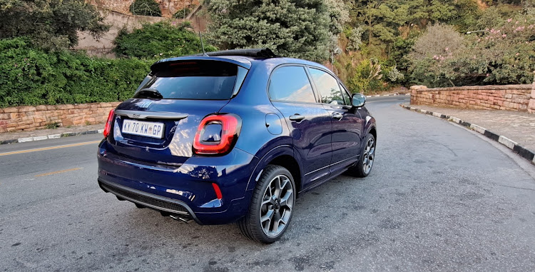 The 500X Sport has athletic design cues like body-coloured wheel arch mouldings, side skirts, 19-inch wheels and dual chrome exhaust tips. Picture: DENIS DROPPA