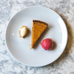 Treacle Tart with Clotted Cream & Raspberry Sauce