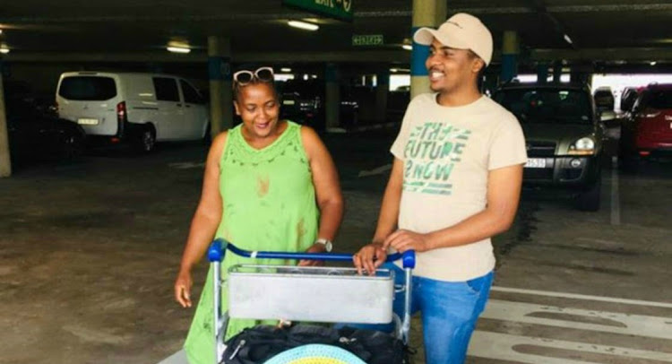 Lwando Mtwa arriving at the King Shaka international airport after returning from his academic duties in China.