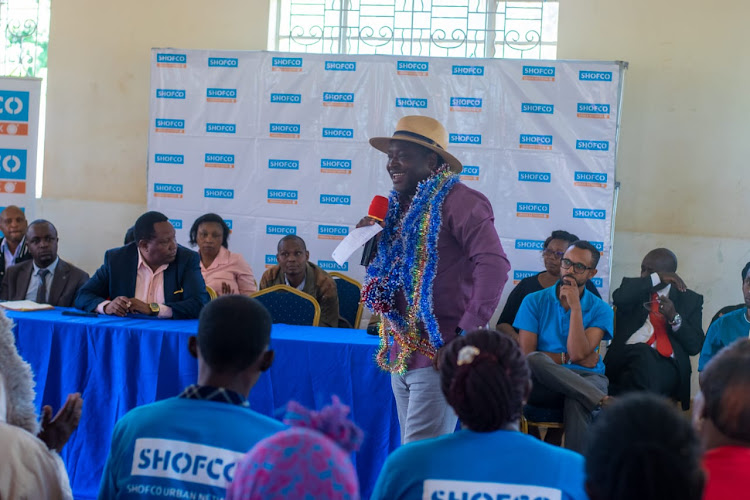 SHOFCO Founder and CEO Dr. Kennedy Odede addressing Shofco Urban Network members in Nyeri Town Constituency, Nyeri County.