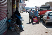 People in the streets of the struggling town of Randfontein, west of Johannesburg.