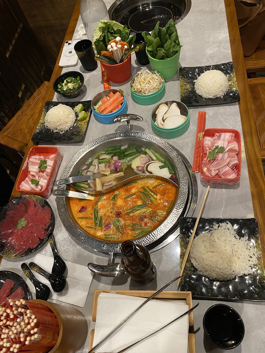 Hot pot with all of the toppings we picked out before cooking them in the broth