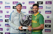 Captains Jos Buttler of England and Keshav Maharaj of SA with the trophy after the series finished all square at 1-1 after the abandoned third ODI at Headingley in Leeds on July 24 2022.